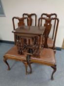 A set of four mahogany Queen Anne dining chairs together with a nest of three tables.