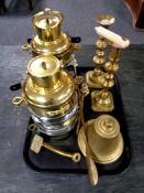 A box containing antique and later brass ware to include candlesticks, shoehorn, letter opener,