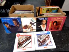 Two boxes containing a quantity of vinyl LPs and 12 inch singles to include The Shadows,