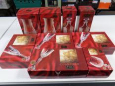 A box containing Chantilly Crystal De France drinking glasses,