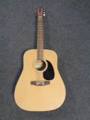 A Cheetah acoustic guitar