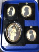 Three early 19th century silhouette portraits together with an antiquarian print of a boy