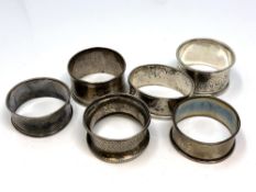 Six assorted silver napkin rings CONDITION REPORT: 72.