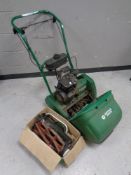 A Suffolk Punch self drive petrol lawn mower