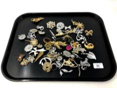 A collection of costume brooches