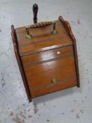 A 19th century mahogany coal receiver with shovel