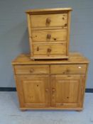 A pine double door dresser base,