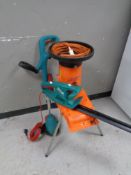 A Bosch strimmer and hedge trimmer together with a garden shredder