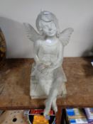 A plastic garden figure of a fairy