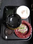 A tray of four glass and ceramic pub ash trays : Murphy's Irish Stout,