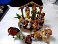 A Hummel figure, O Holy Night, 2016 first issue, together with two further Goebel figures, Angels,