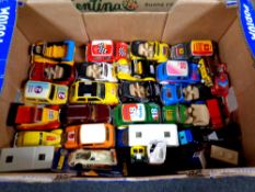A box containing assorted unboxed die cast vehicles to include rally cars,