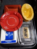 A tray of five vintage glass and ceramic ash trays : Lion Bitter, Benson & Hedges,