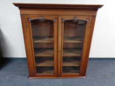 A Victorian mahogany double door glazed bookcase top