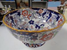 A 19th century ironstone amethyst Japan bowl, diameter 27.