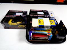A tray containing assorted boxed die cast vehicles to include Dinky Toys, Atlas Editions,