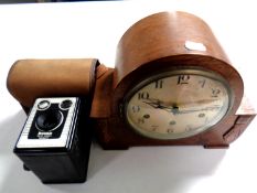 A 1930s oak Westminster chime mantel clock with silver dial together with a Brownie box camera