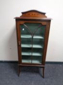 An Edwardian inlaid mahogany display cabinet