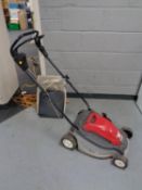 A Honda HRE 370 electric lawn mower