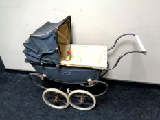 A mid 20th century Pedigree doll's pram