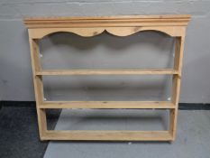 An antique pine plate rack