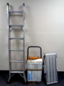 A sack barrow together with a folding camp kitchen,