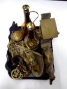 A tray containing assorted brass wares to include horse brasses on leather straps, horse ornaments,