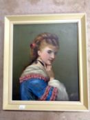 A 20th century oil on board, female portrait,