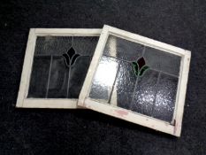 Two framed stained leaded glass windows