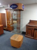 An illuminated shop display stand bearing Aynsley advertisement