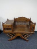 A colonial style telephone table on X frame support