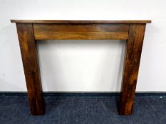 A contemporary hardwood fire surround