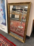 A gilt framed mirror,
