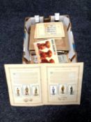 A box containing a very large quantity of cigarette cards in albums