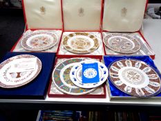 Six boxed collector's plates by Coalport,