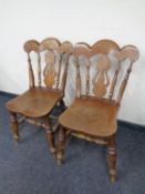 A pair of beech kitchen chairs