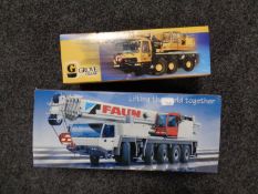 A Grove GMK3050 crane together with a Tadano Faun all terrain crane ATF100-5 die cast vehicles,