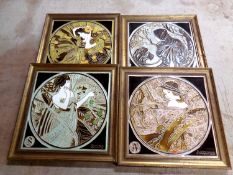 Four framed Art Nouveau style tiles,