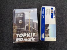 A Potainigo die cast crane together with a Potain Topkit Md Matic crane,