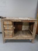 A 20th century wooden work bench,