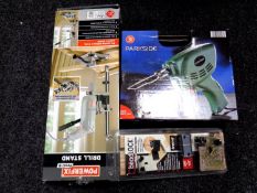A basket containing power fix drill stand, Parkside solder gun,