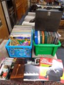Two crates and a case containing a quantity of vinyl LPs,
