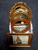 A basket containing a gilt framed oil on board, boats on open water,