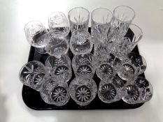 A tray containing lead crystal glassware to include high ball glasses, whiskey tumblers,