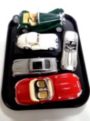 A tray containing a Danbury mint pewter E Type Jaguar with certificate together with four other