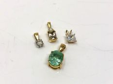 Four 18ct gold pendants. CONDITION REPORT: 6.
