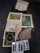 An antique mahogany oval bevelled mirror together with a large quantity of assorted framed pictures