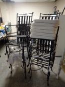 A set of six metal stacking garden armchairs with cushions
