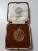 A HMS Ganges Naffi Sports medal in box