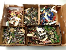A box of a large quantity of miniature plastic soldiers and figures